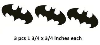 Three black bat-shaped decals on a white background with text indicating size.