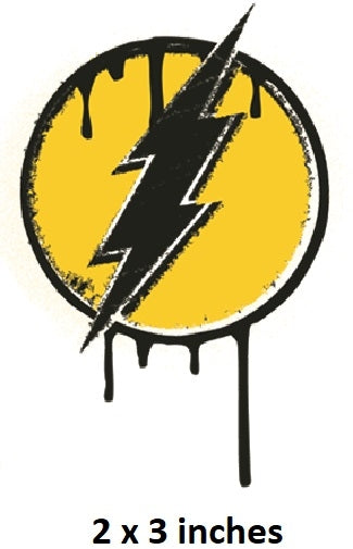 Black lightning bolt symbol on a yellow circle with '2 x 3 inches' text below.