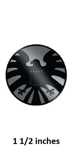 Black and gray circular emblem with a design, labeled '1 1/2 inches' on a white background.
