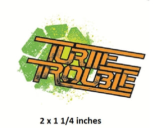 Logo for 'Turtle Trouble' with a green splash on a white background